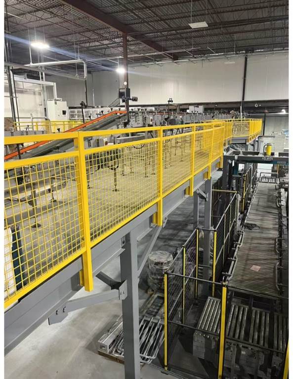 Production mezzanine with safety railing